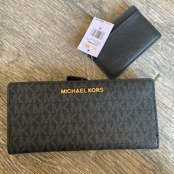 Michael Kors Handbags - New MK Jet set travel lg cryl w case card 🖤